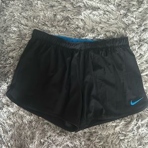 Nike shorts, black and blue, dri-fit, with blue spandex shorts underneath